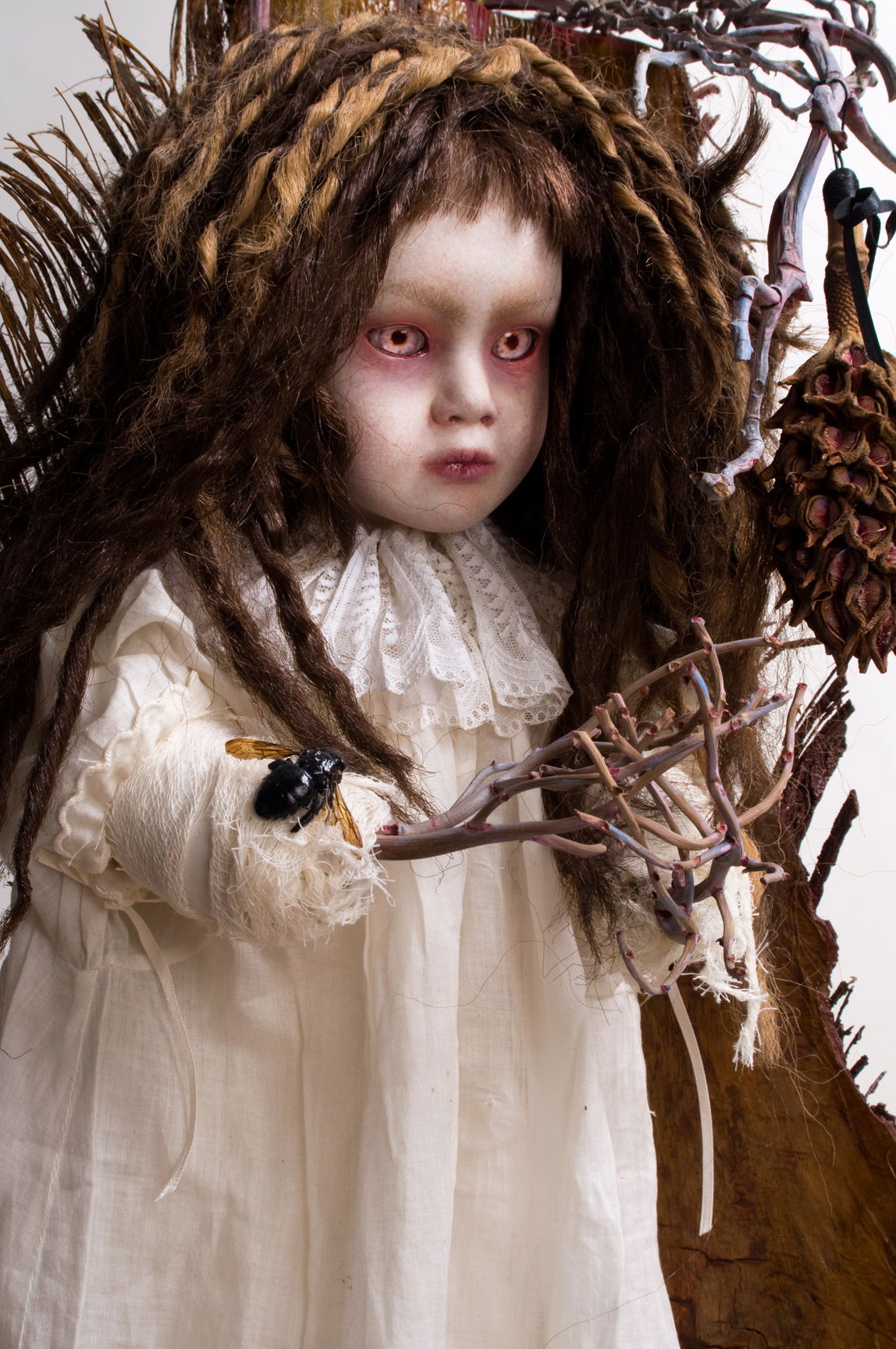 gothic artdoll mixed media damsel with gnarled branches in place of her severed hands wearing white nightie
