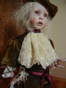 close-up face romantic gothic artdoll porcelain repaint, wearing brown velvet and white lace holding scrolls