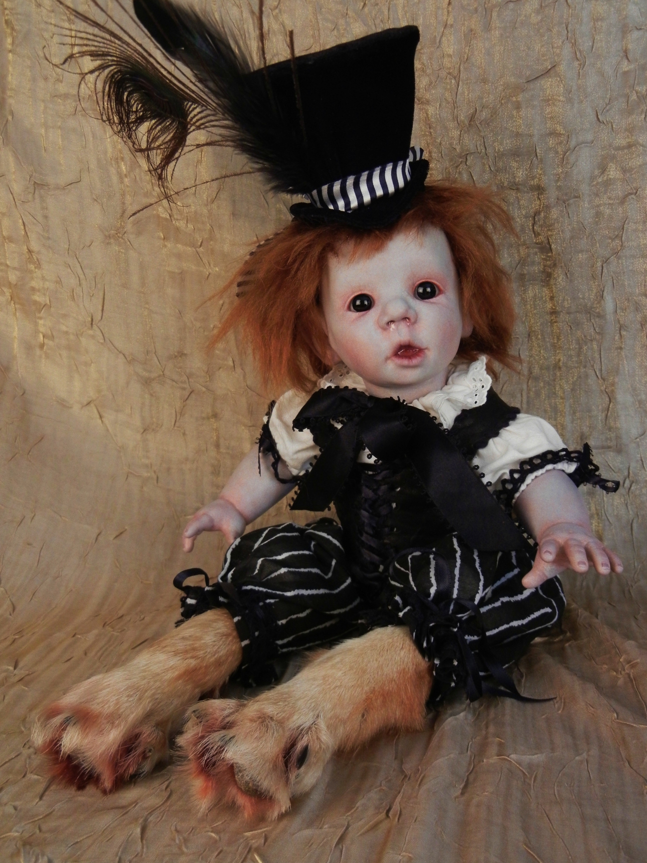 mixed media artdoll porcelain doll red hair repainted face wears feathered top hat and bloomers taxidermied feet sitting