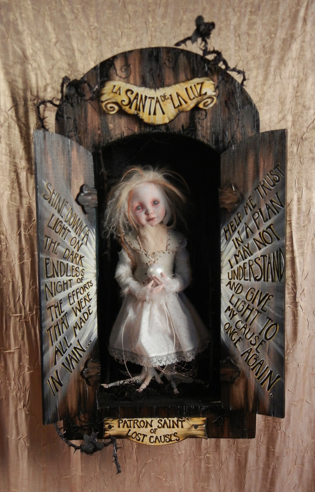 open mixed media cabinet reveals taxidermy artdoll assemblage blonde wild doll in white dress with bird feet