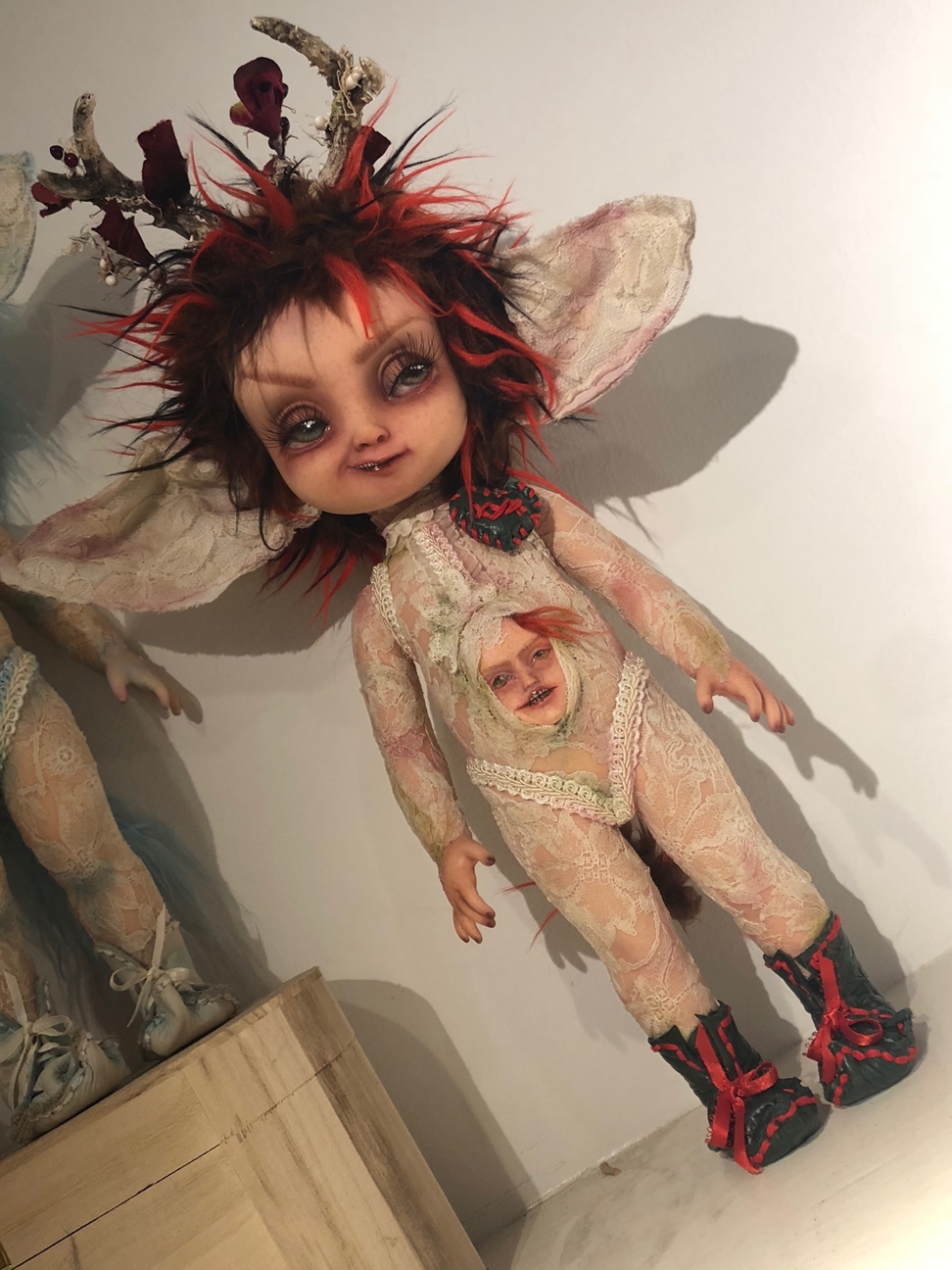 gothic repaint fantasy mythical sprite doll decoupaged with antique lace and trims big eared and wearing antlers a face in her belly