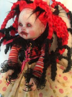 gothic repaint porcelain doll dark circus clown with bright red and black braids, party hat, striped and polka-dot dress
