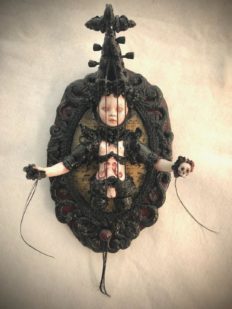mixed media assemblage dark art doll violin holding a skull