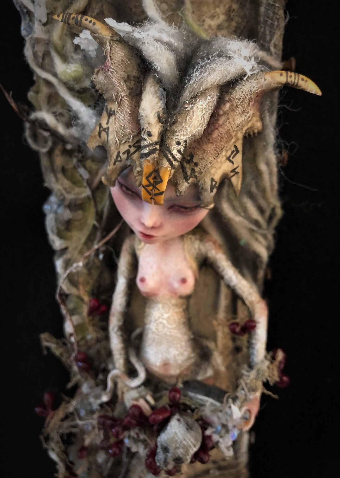 Mixed media assemblage repainted goth pagan doll