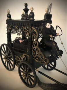 dollhouse miniature dolls in a funeral cart carriage hearse
