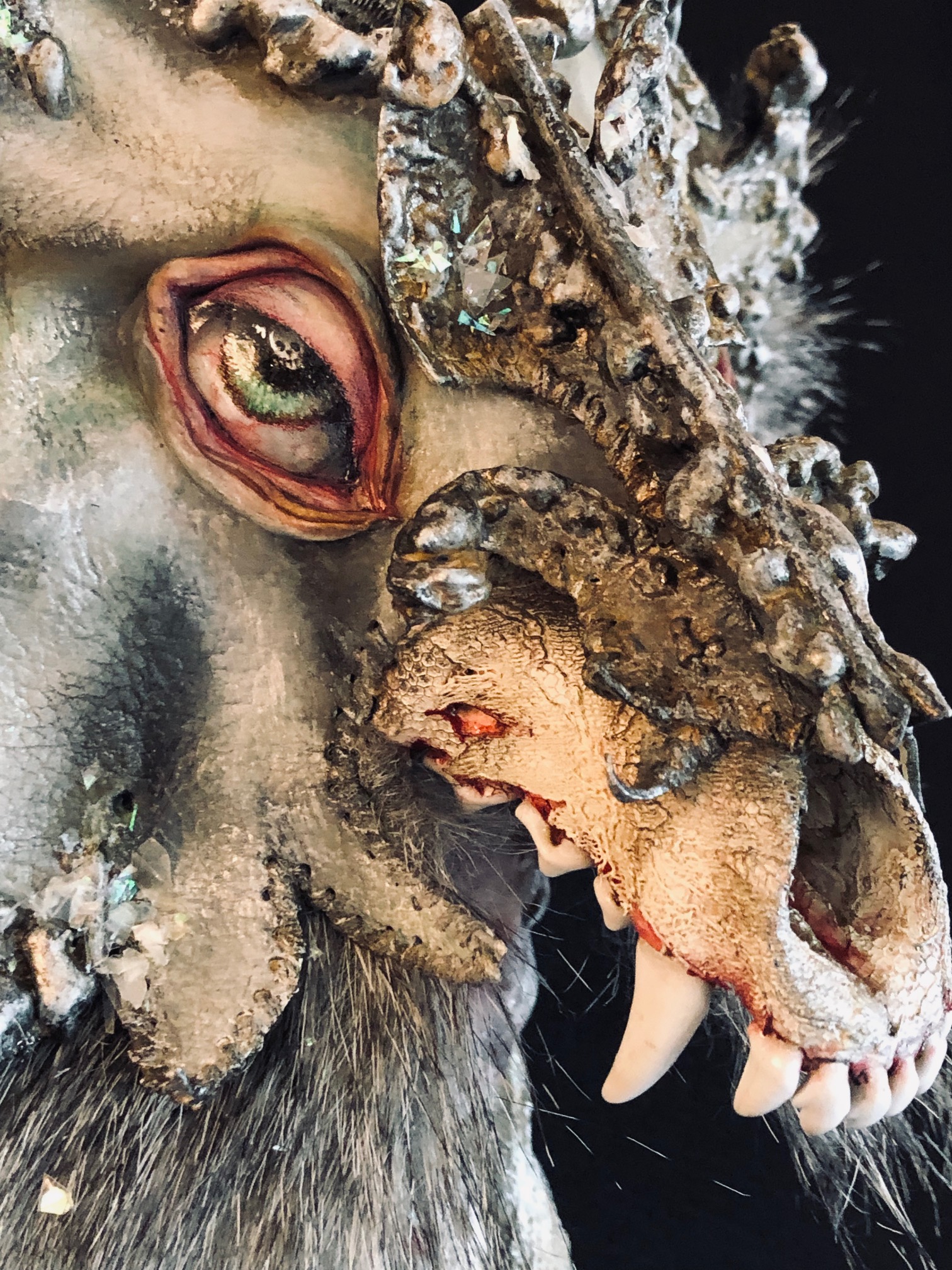 close-up of mixed media assemblage wolf skull headdress