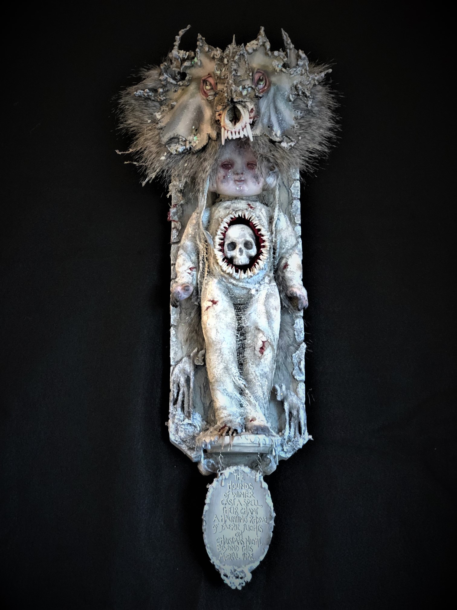 mixed media assemblage plaque white winter warrior doll wearing a wolf skull headdress