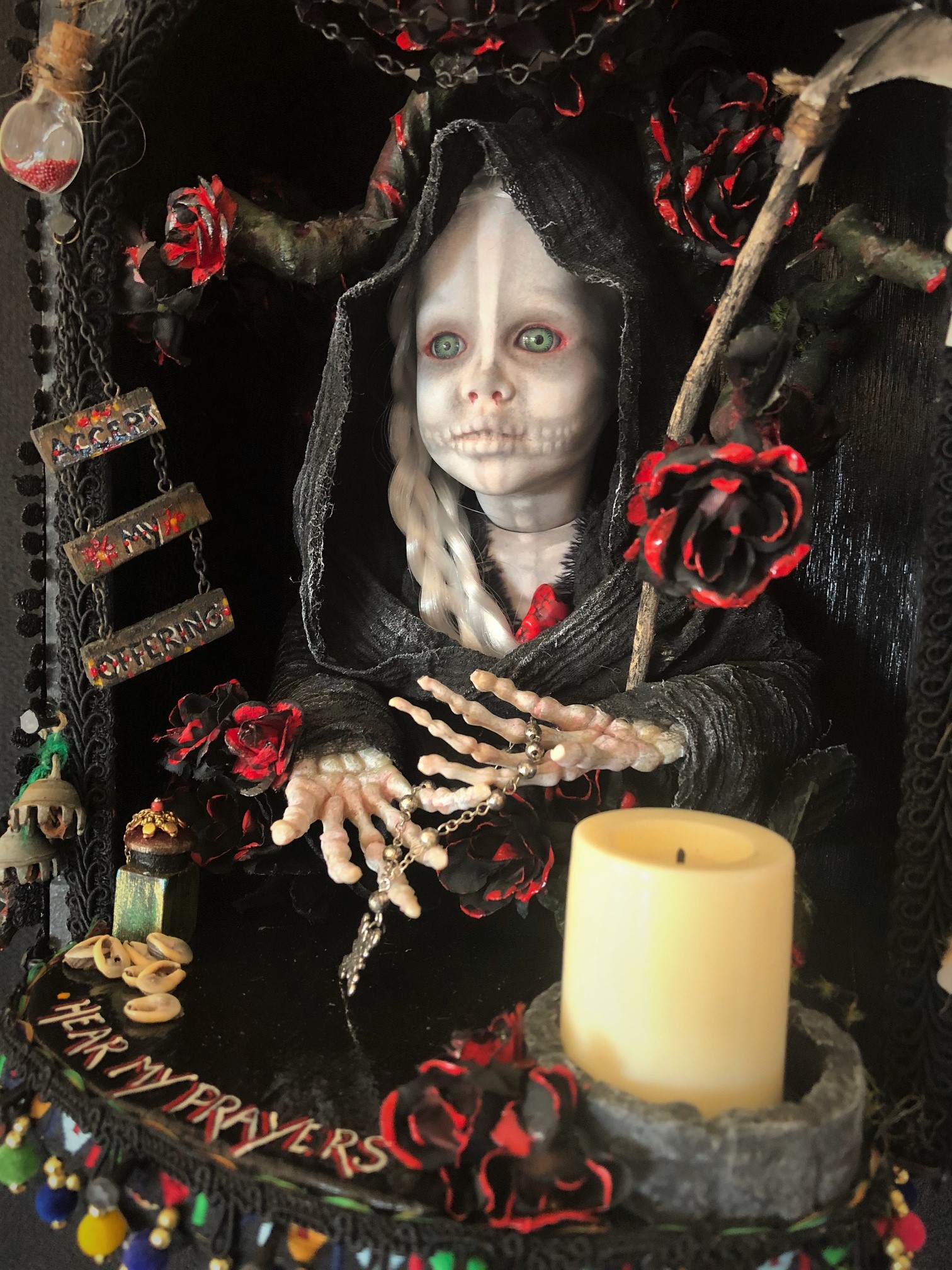 close up of Santa Muerte altar box and nightlight mixed media assemblage candle