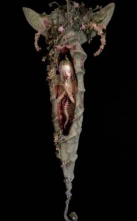 mixed media assemblage sleeping fairy doll in a cocoon