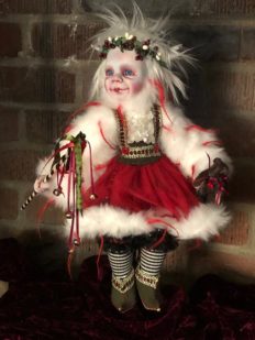 mixed media artdoll holiday elf girl wearing red and white velvet fur trimmed dirndl dress, floral crown, curled elf shoes