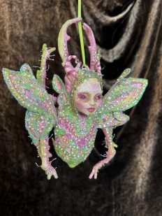 Papier-mâché pink and green jewelled beetle ornament mixed media art