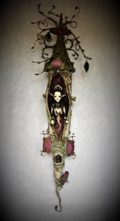 Mixed media assemblage of dark faerie granting wishes in her House of Intention