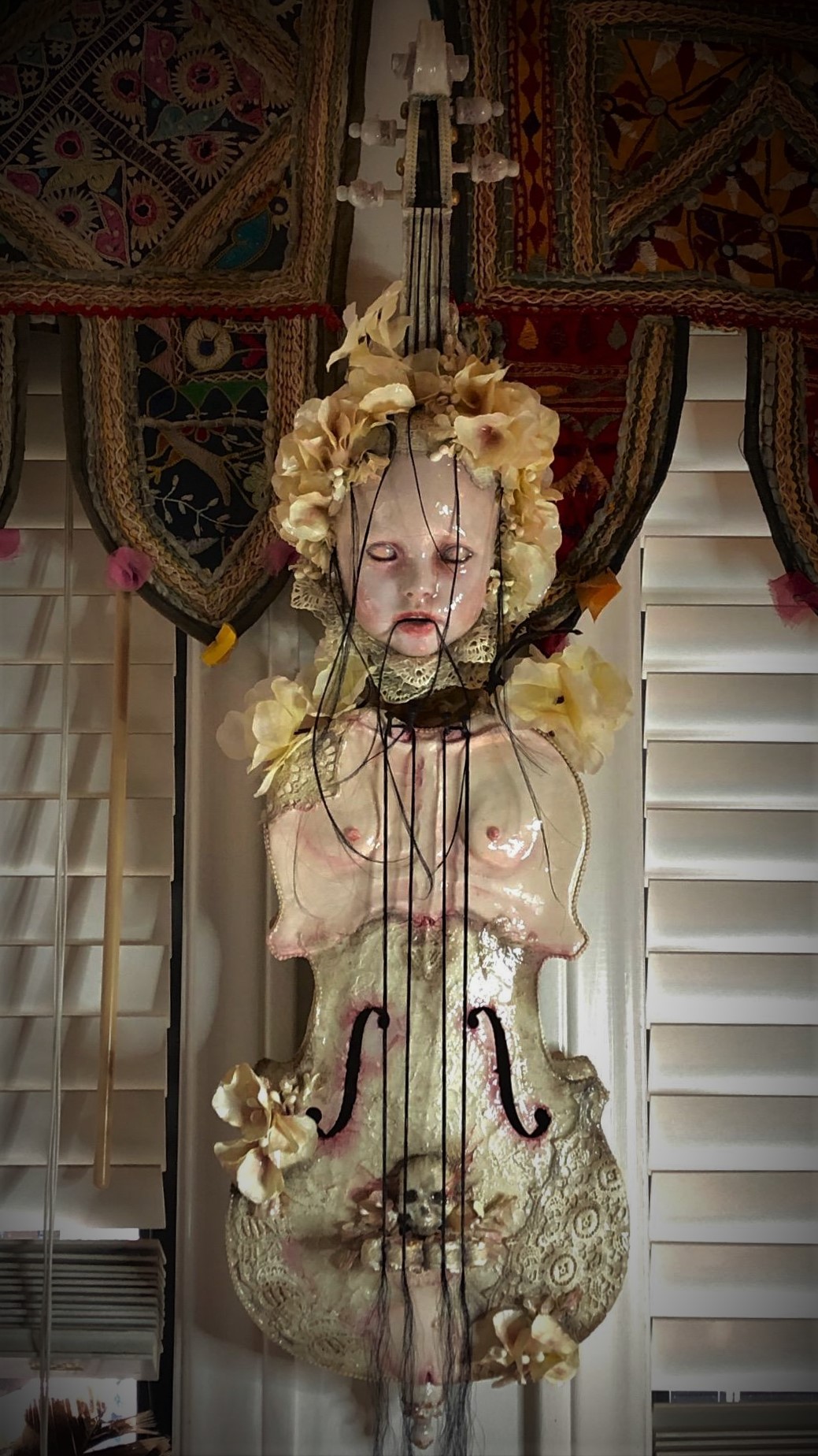 ghostly white mixed media assemblage art doll head on violin body