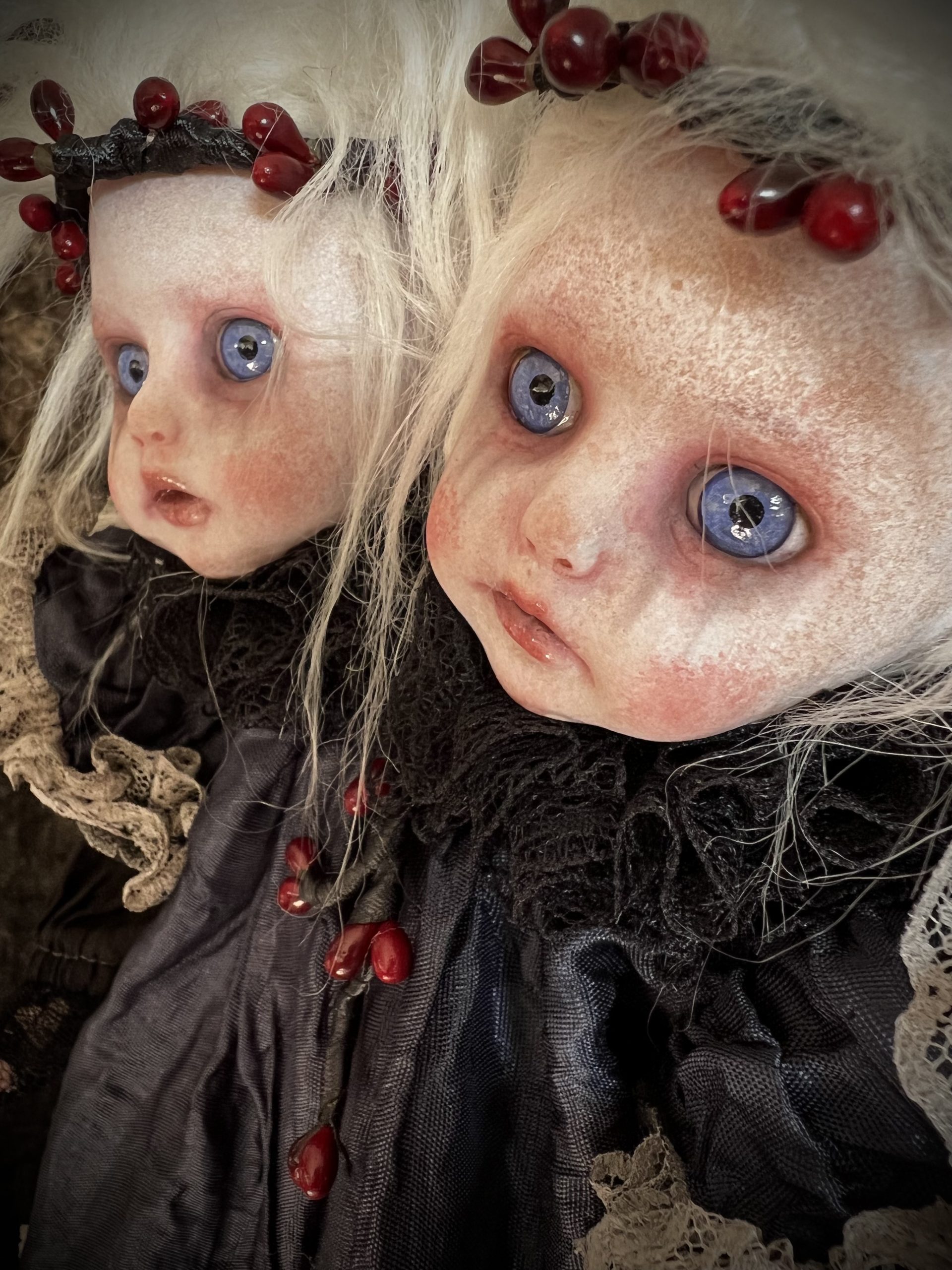 close up Conjoined Twins art doll gothic holiday themed blond with blue eyes