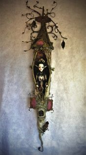 Mixed media assemblage of dark faerie granting wishes in her House of Intention