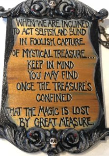 close-up hand painted lettered wooden sign with gothic verse
