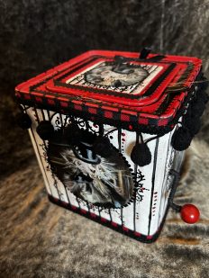 hand-painted gothic mixed media jack in the box assemblage with a weasel wearing a top hat