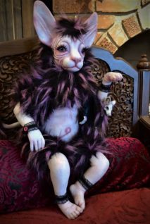 hybrid pussy cat human doll huge cat ears made of hand painted vinyl and purple and black acrylic faux fur holds a dead rat purse