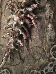 close up detail dark art mixed media assemblage sculpture bone & rope