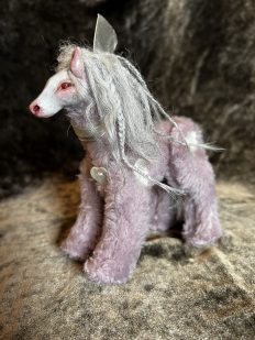light pink button-jointed miniature horse christmas tree ornament