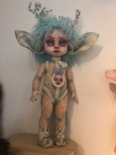 gothic repaint fantasy mythical sprite doll light blue hair decoupaged with antique lace and trims big eared and wearing antlers a face in her belly