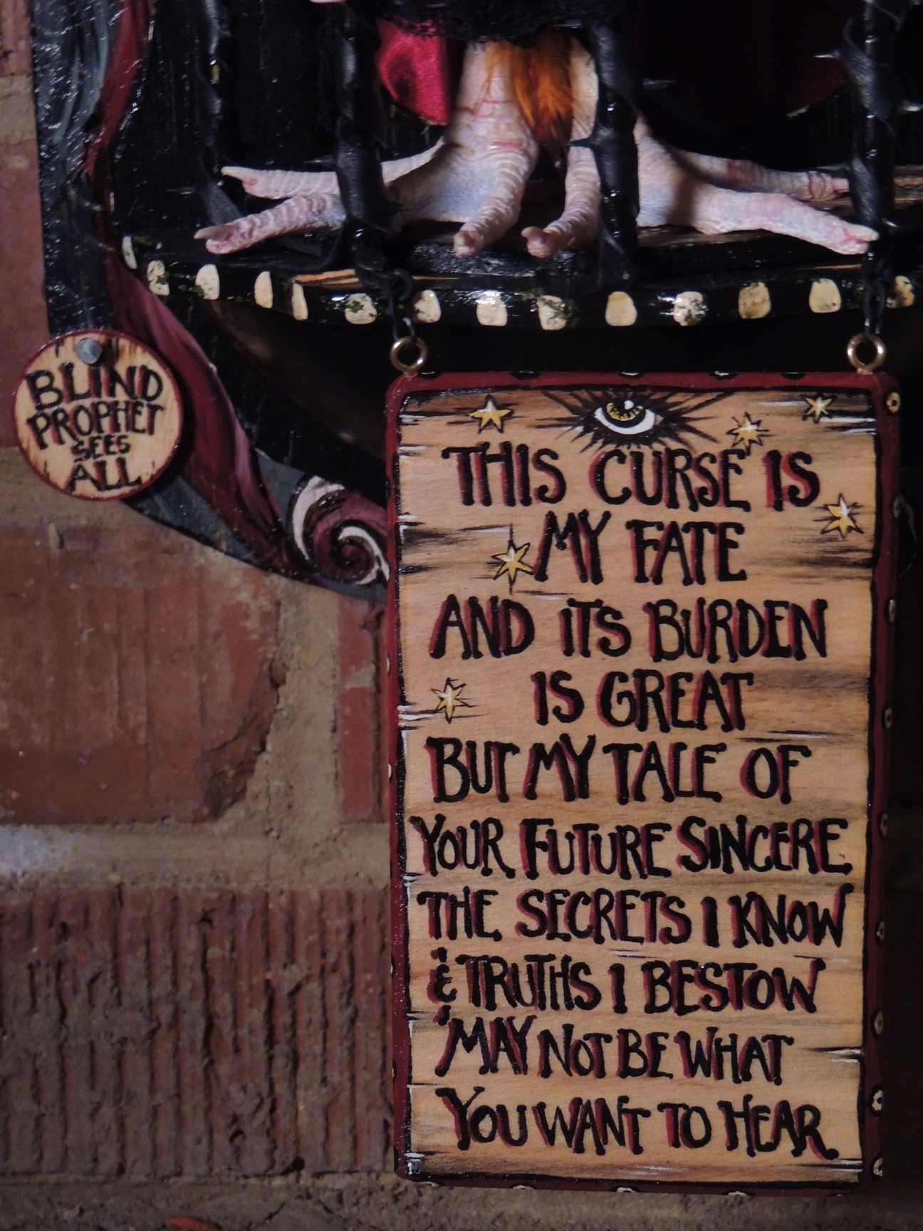 close-up hand painted lettered circus-themed wooden sign with verse